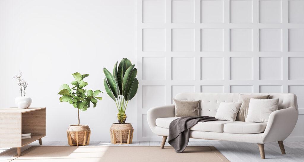 Stilvolles Wohnzimmer-Interieur mit Holz-Couchtisch, Pflanzen und eleganten Accessoires